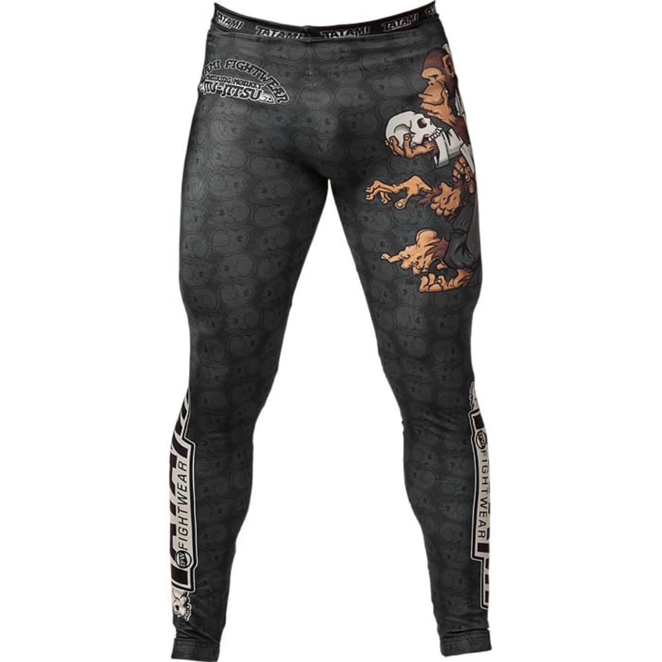 pantalon style legging MMA homme avec motifs singe avec tête de mort dans sa main et des imprimé tête de mort sur l'ensemble du pantalon